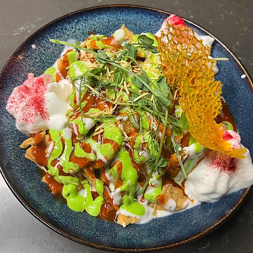 Papri chaat with yogurt and chutneys