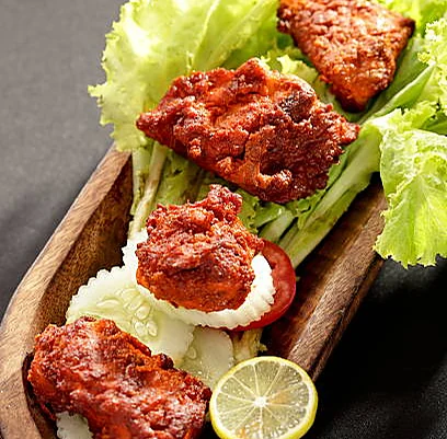 Fish tikka with lime and salad