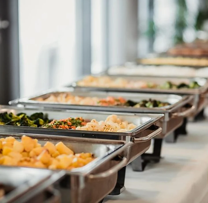 Indian catering buffet in chafing dishes